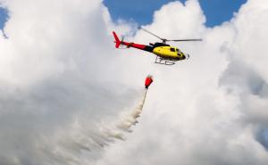 Reul stellt neue Löschbehälter der Polizeifliegerstaffel gegen Waldbrände vor